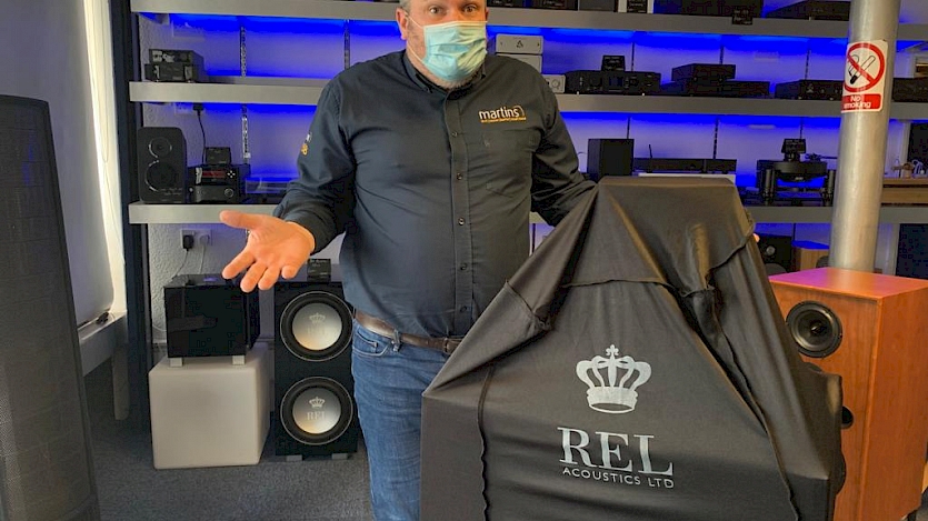 steve stood next mysterious rel package covered in black rel branded cover